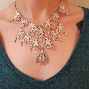 Fun costume silver necklace.
